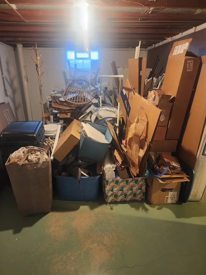 Roll-off dumpster container at job site for 2 Yard Dumpster Rental in Milo